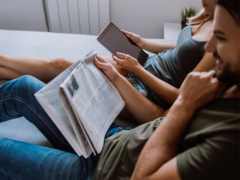 Young couple researching contraception options and deciding that vasectomy is right now they have finished their family.