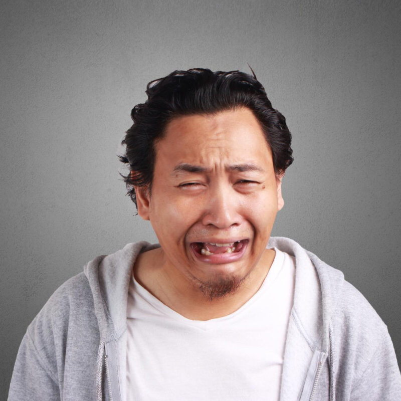 Man looking fearful as he doesn't understand how painless a vasectomy really is